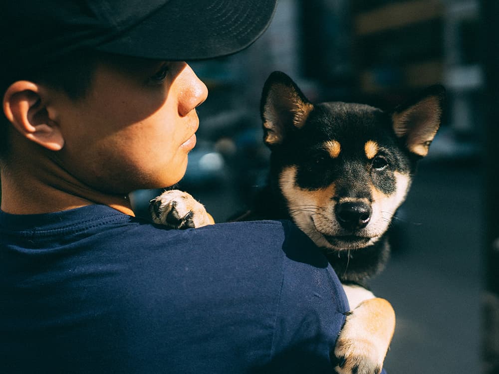 andrew-leu-9_9rEP12i5U-unsplash Man and dog